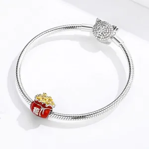 Sterling silver snake chain bracelet with red enamel lucky bag charm and zircon cat clasp