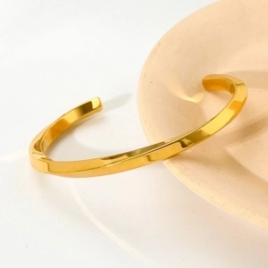 Polished 18k gold plated stainless steel twisted open cuff bracelet for women