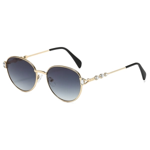 Lunettes de soleil rondes en métal doré de luxe avec branches ornées de diamants