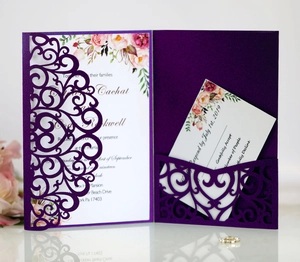 Detailed laser-cut purple floral wedding invitation with watercolor insert cards