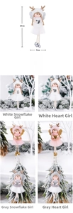 Detail of plush Christmas angel ornaments in white pink and gray with wings and antlers
