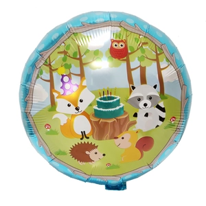 Detailed close-up of a round foil balloon with cartoon forest animals and birthday cake
