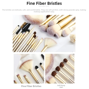 Detailed macro view of champagne gold makeup brushes with soft horse hair and fiber bristles