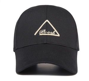Close-up of black baseball cap featuring a triangular Break embroidered patch on cotton twill