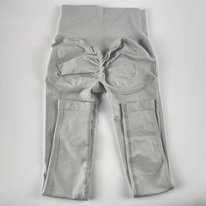 Detail of high waist seamless yoga pants in grey with scrunch butt lifting texture