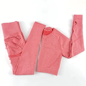 Detail of seamless yoga set with thumb holes on long sleeves and contouring high waist leggings