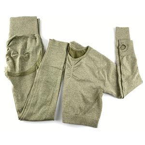 Flat lay of seamless yoga set showing thumbhole cuffs and high waist texture details