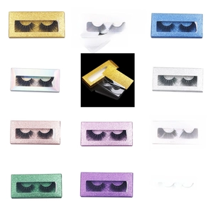 Glitter paper lash boxes with large triangle trays in multiple vibrant colors and clear windows