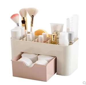 Two-tier pink and beige plastic cosmetic organizer with drawer and multi-compartment top