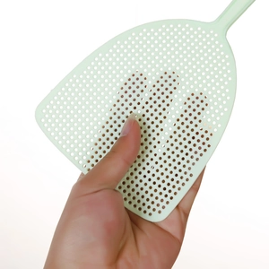 Light green plastic fly swatter with flexible long handle and fine mesh on white background