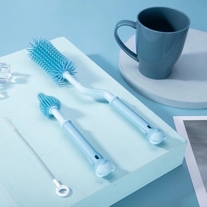 3-piece blue silicone baby bottle brush set with 360-degree rotating handles for cleaning