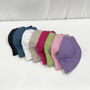 Sparkling rhinestone cotton bucket hats shown in eight vibrant colors for sun protection