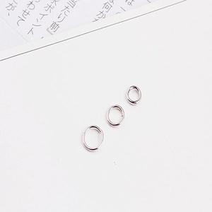 Polished silver jump rings in three sizes for DIY jewelry making and connecting