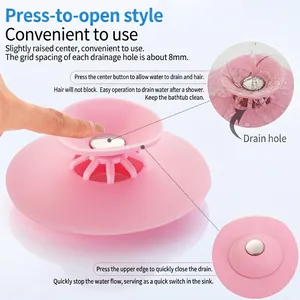 Pink silicone sink stopper with 8mm drainage grid and push-button toggle for bathrooms