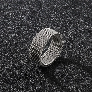 8mm silver stainless steel mesh ring with a geometric woven structure on black background