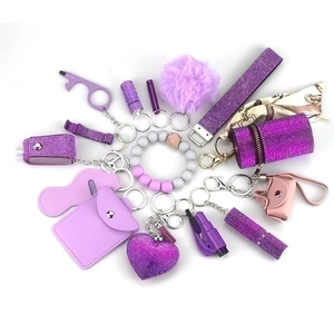 Purple 15-piece safety keychain set for women with alarm pompom and wristlet