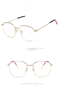 Front and side view of gold metal thin frame glasses with red and black temple tips