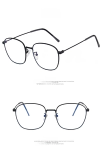 Front and side views of lightweight black metal eyeglasses with slim retro frames