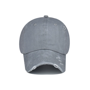 Detail of distressed grey washed cotton baseball cap with vintage frayed brim effects