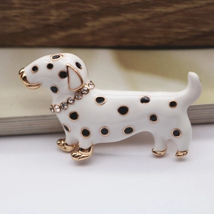 Dalmatian dog brooch pin in gold-plated alloy with black enamel spots and crystals