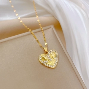 Luxurious gold heart pendant necklace with 3D tulips and sparkling crystals on silk