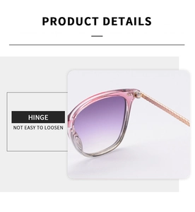 Détail de la charnière robuste et des branches en métal doré rose sur lunettes roses