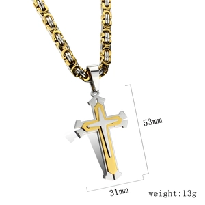 Detailed view of two-tone steel cross pendant showing 53mm height and 31mm width