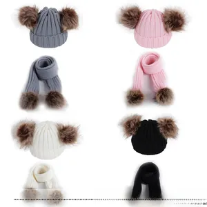 Winter knit hat and scarf set for children featuring double faux fur pom-poms in four colors