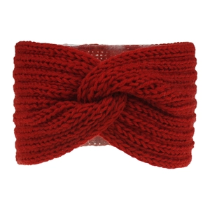 Macro shot of red knitted headband featuring a crossover twist design for winter