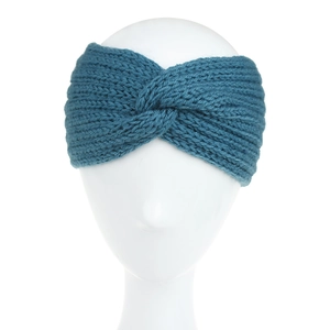 Detail of teal knitted twist headband for women with thick wool texture for winter