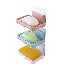 Wall-mounted soap holder set with drainage in pink, blue, and white colors