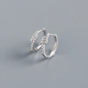 Close-up of minimalist S925 sterling silver hoop earrings with micro-set cubic zirconia