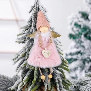 Pink plush Christmas angel tree ornament with gold wings and knit hat hanging on a tree