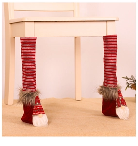 Close-up of Christmas gnome chair leg covers with red striped knit and white beard
