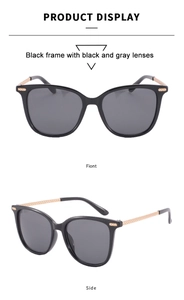 Détail de lunettes de soleil carrées avec monture noire et branches dorées tressées