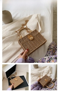 Detail der khakifarbenen Strohhandtasche mit goldenem Metallverschluss und Kettenriemen