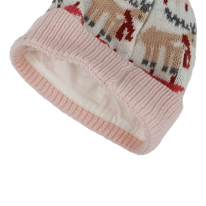 Detailed view of the warm inner lining and festive reindeer knit pattern of the kids hat