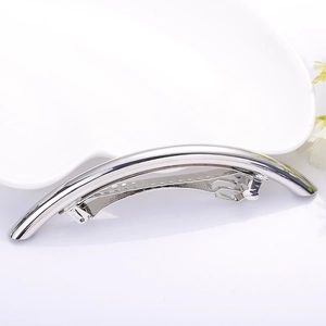 Polished silver metal spring hair clip on white heart tray, minimalist Korean hair accessory