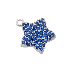 Close-up of a silver star pendant featuring a vibrant blue gemstone on white background