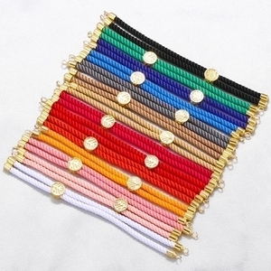 Handwoven Tree of Life Milan cord bracelets with gold metal accents in various vibrant colors