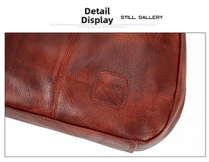 Detailed macro view of dark brown pebbled leather texture and stitching on the handbag