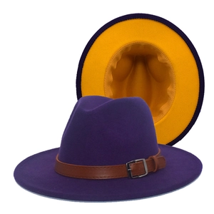 Detail of wide-brim purple wool fedora with ginger lining and brown leather buckle strap