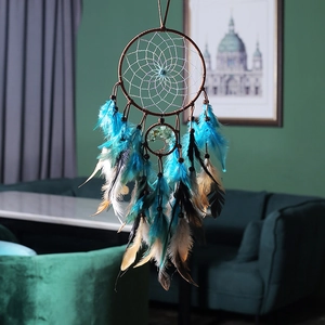 Indian style Tree of Life dream catcher with blue and brown feathers for wall decor