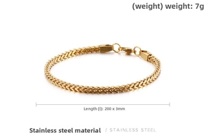 Detail of 3mm golden stainless steel wheat chain bracelet with 200mm length and lobster clasp
