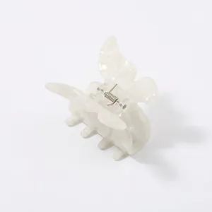 Elegant butterfly hair claw clip in cream white cellulose acetate with pearlescent texture