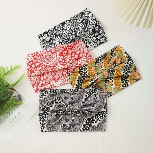 Set of four stylish knotted floral and leopard print wide headbands for women's yoga