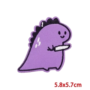 Detail of purple cartoon dinosaur embroidery patch with 5.8x5.7cm size measurement