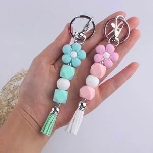 Cartoon flower silicone beaded bracelets with tassels and metal lobster clasps for bags