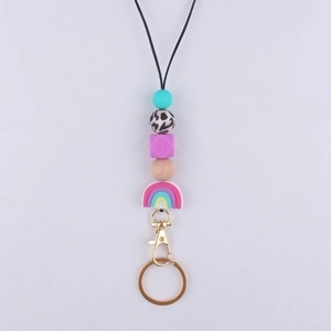 Silicone beaded lanyard with rainbow pendant and rotating metal clasp for badges