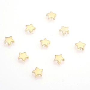 Detailed view of pale yellow translucent star-shaped crystals for DIY jewelry making